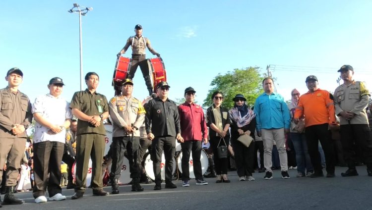 MAKMUR MARBUN IKUT DEFILE MARCHING BAND LATSITARDA XLIV 2024