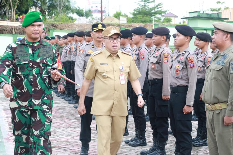 Pj. Bupati PPU Makmur Marbun Pimpin Apel Pasukan Pengamanan Pilkada Tahun 2024