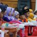 Ketua DWP PPU Riawati Tohar Buka Lomba Mewarnai TK se-Kabupaten dalam Rangka HUT ke-25 DWP