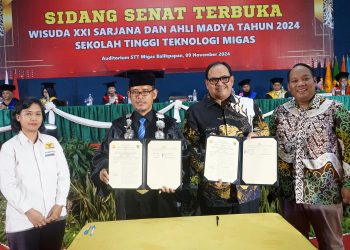 Pj Bupati PPU Hadiri Wisuda STT Migas Balikpapan dan Tandatangani MoU Kerja Sama